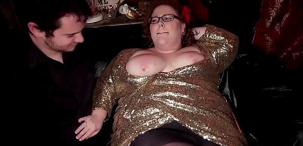  Huge tits mistress controls her slaves at party